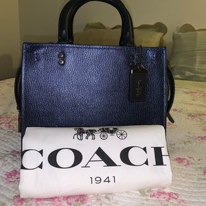 COACH Metallic Blue Rogue 25